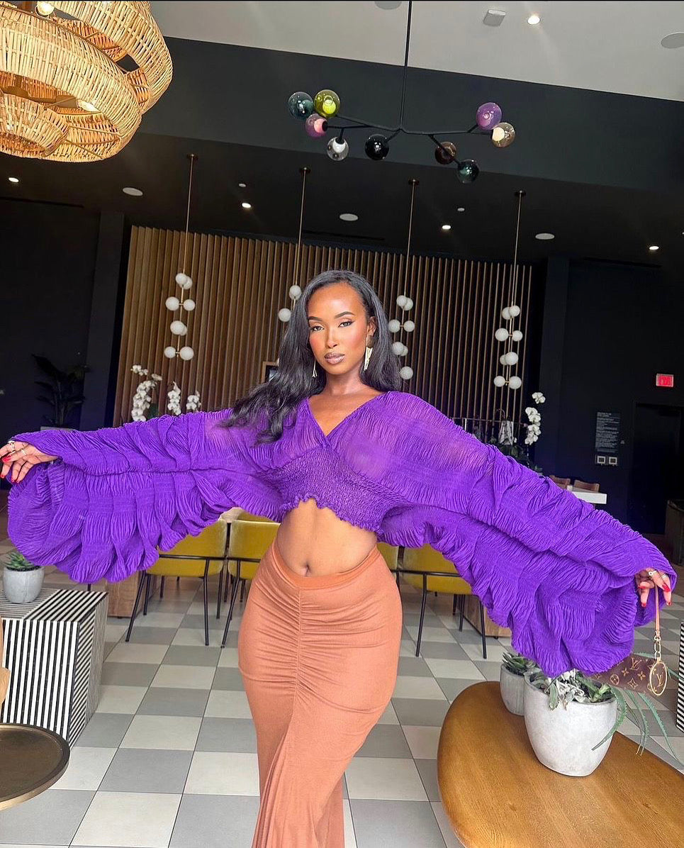 Dramatic luxe top